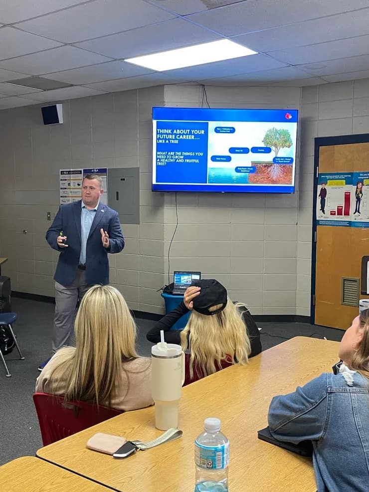 Brandon presenting a career talk to students about thinking about their future
