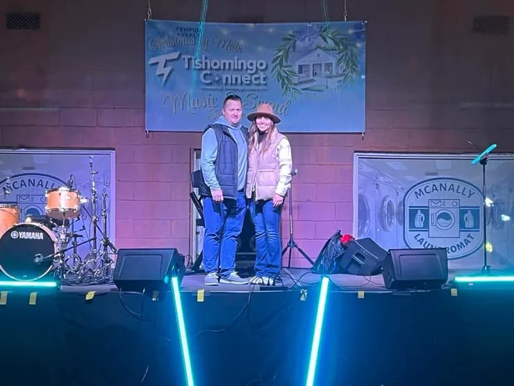Brandon and Tamara on stage at Tishomingo Connect Christmas on Main
