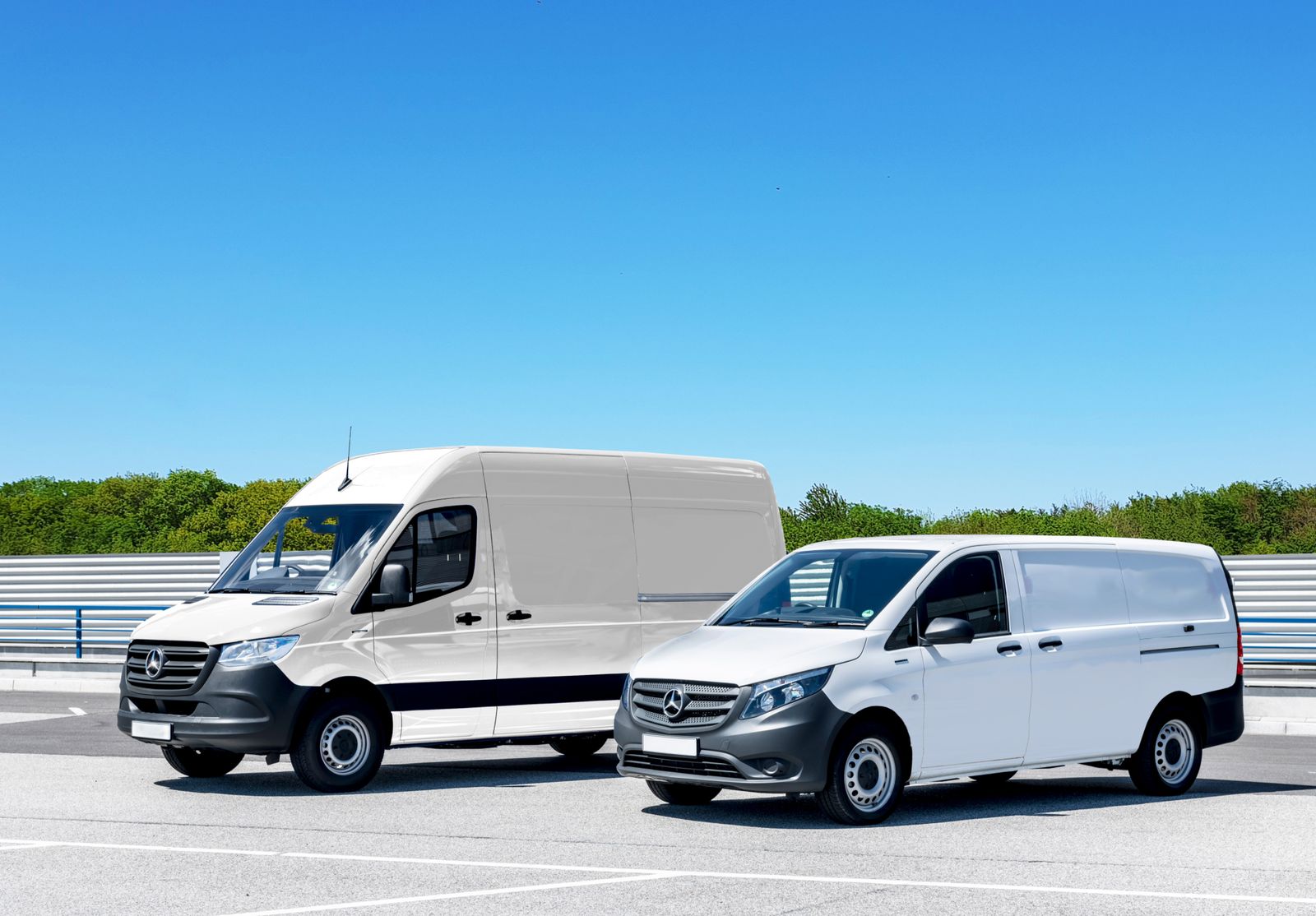 White work vans parked in a row